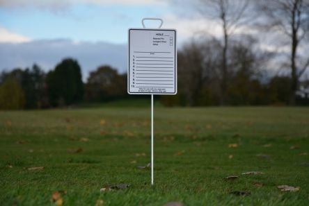 longest drive & nearest the pin sign